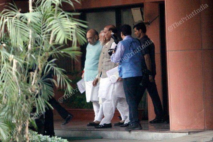 PM Narendra Modi, Union ministers Rajnath Singh and Amit Shah come out of Parliament House Library