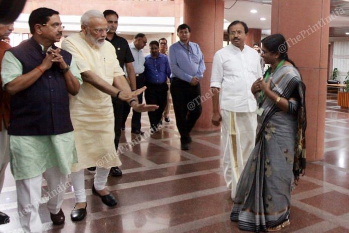 PM Modi requests YSR Congress MP Venkata Satyavathi not to touch his feet | Photo: Praveen Jain | ThePrint