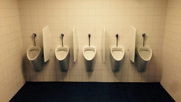 This urinal in a Scottish pub invites people to literally piss on their past