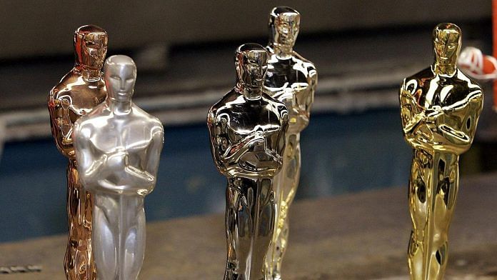 Oscar statuettes in different stages of the plating process, wait to be finished at a factory in Chicago | Photo: Frank Polich | Bloomberg