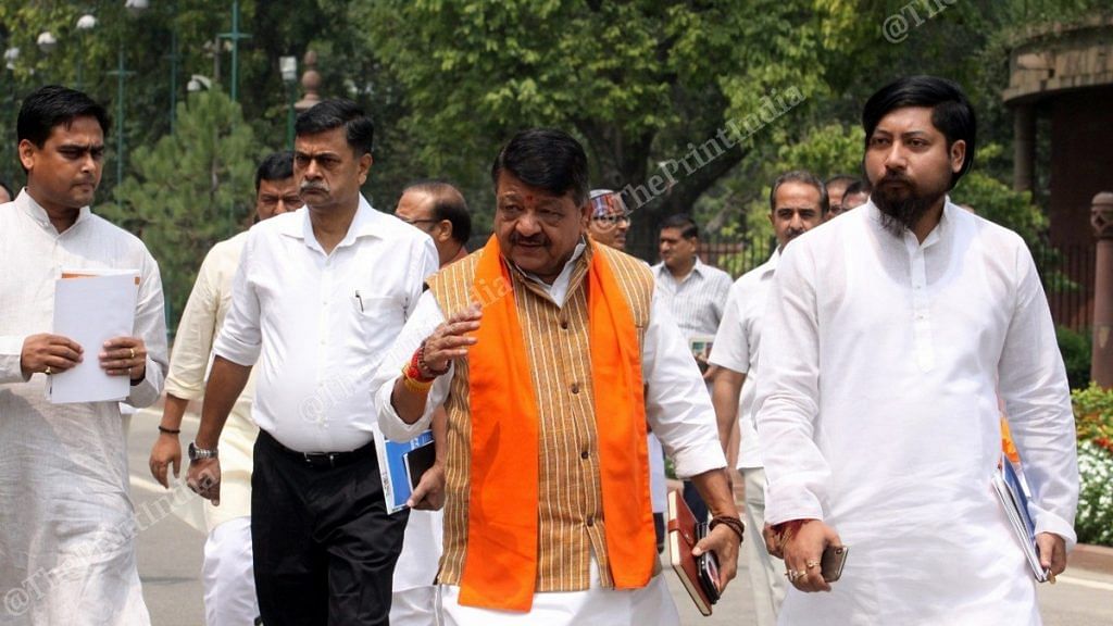 National General Secretary of BJP Kailash Vijayvargiya with son Akash Vijayvargiya right)