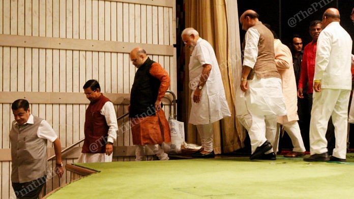 BJP leaders (left to right) Nitin Gadkari, Pralhad Joshi, Amit Shah, Narendra Modi, Rajnath Singh,Thawarchand Gehlot leave the stage after event