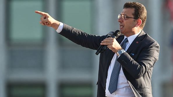 Newly elected Mayor of Istanbul Ekrem Imamoglu of the main opposition Republican People's Party (CHP) speaks to supporters after taking the Mayoral mandate in front of Istanbul Municipality building. | Bloomberg