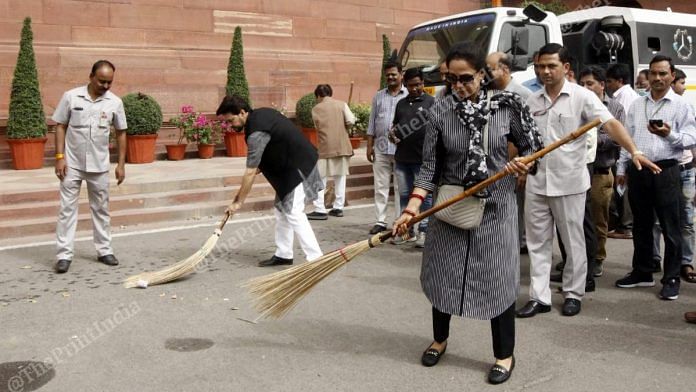 MP Hema Malini (right) and MoS Anurag Thakur were seen sweeping in the Parliament premises
