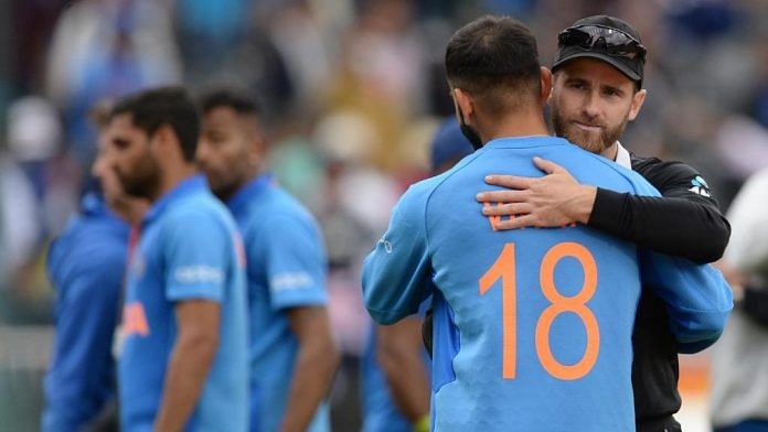 Indian captain Virat Kohli and New Zealand captain Kane Williamson embrace after the match. | @ICC | Twitter