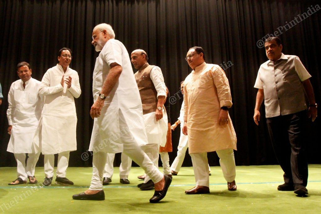PM Narendra Modi walks out after the meet