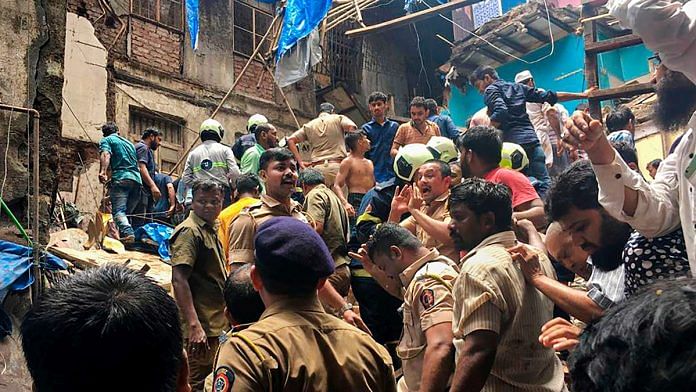 Police personnel and rescue teams at the site after a four-storey building collapsed at Dongri in Mumbai | PTI