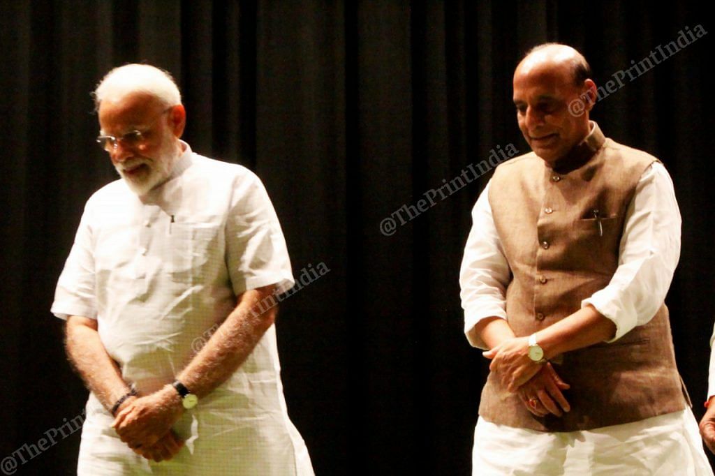 PM Narendra Modi stands with Defence Minister Rajnath Singh