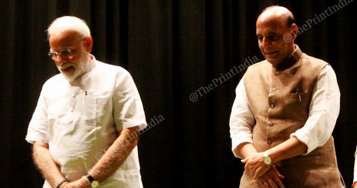 PM Narendra Modi stands with Defence Minister Rajnath Singh