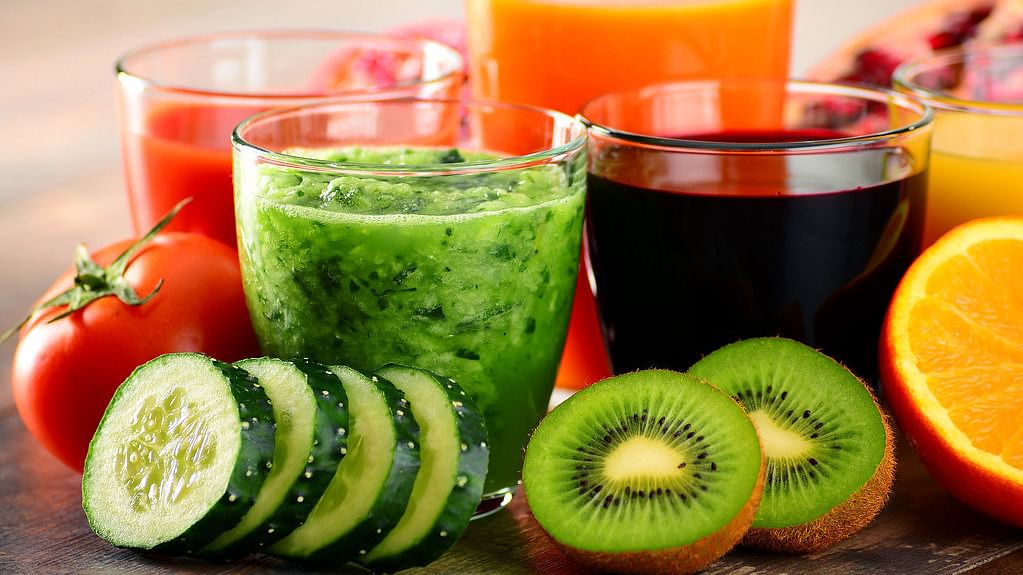 Glasses with fresh organic vegetable and fruit juices. | Flickr