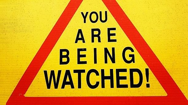 A signboard displaying 'You are being watched'