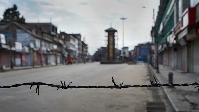 A view of a deserted street during restrictions at Lal Chowk in Srinagar | PTI