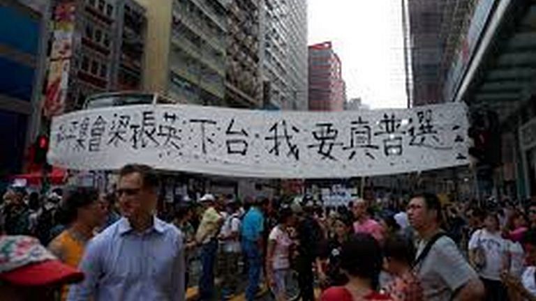 China plans to tighten its grip on Hong Kong with a tough security law