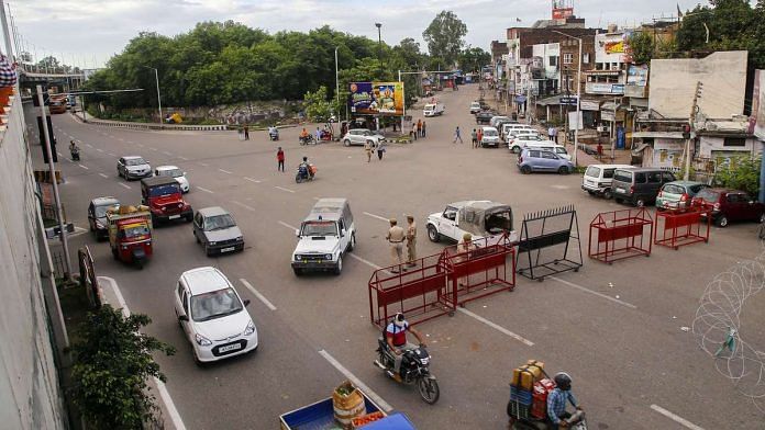 Vehicles ply as restrictions continue in the Valley to maintain law and order after Article 370 was revoked, in Jammu, on 8 August, 2019 | PTI