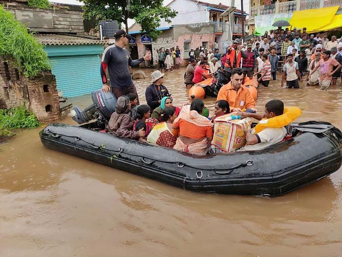 Indian Navy personnel rescue residents from flood-hit area, in Sangli and Kolhapur districts of Maharashtra