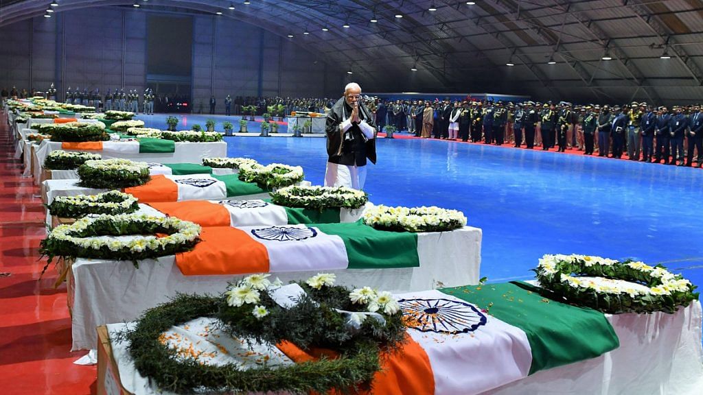 PM Narendra Modi paying homage to killed CRPF Jawans, at Palam airport,New Delhi, after Pulwama attack | File photo: PIB