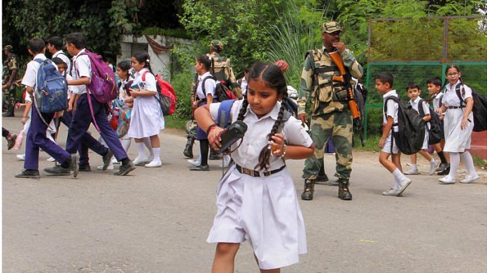 Jammu: Students go to school as they reopen after five days closure following a security clampdown in view of abrogation of Article 370 and bifurcation of Jammu and Kashmir into two union territories, in Jammu, Saturday, Aug 10, 2019. (PTI Photo) (PTI8_10_2019_000094A)(PTI8_10_2019_000202B)