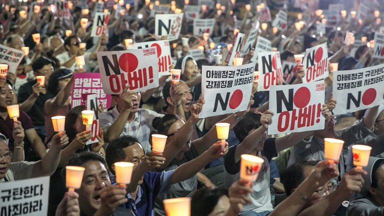 Thaw in trade war as Japan allows export of computer chip material to South Korea