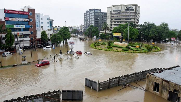 A view of flooded streets in the city following incessant monsoon rainfall, in Vadodara, | PTI