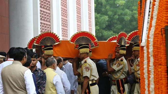 Arun Jaitley's body was taken to the BJP headquarters from where it was carried in a flower-decked gun carriage to the cremation ground | Suraj Singh Bisht | ThePrint