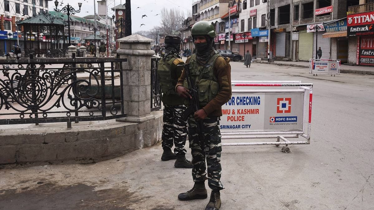 CRPF personnel stand guard in Srinagar CRPF personnel stand guard in Srinagar