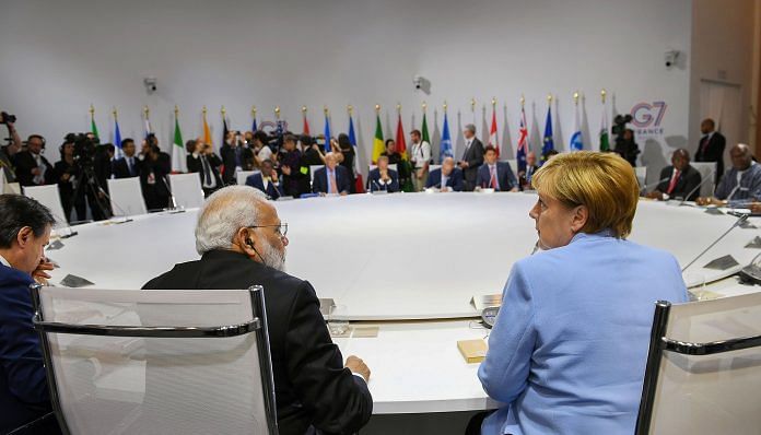 Biarritz: Prime Minister Narendra Modi, German Chancellor Angela Merkel and other world leaders at the G7 Summit in Biarritz | PTI
