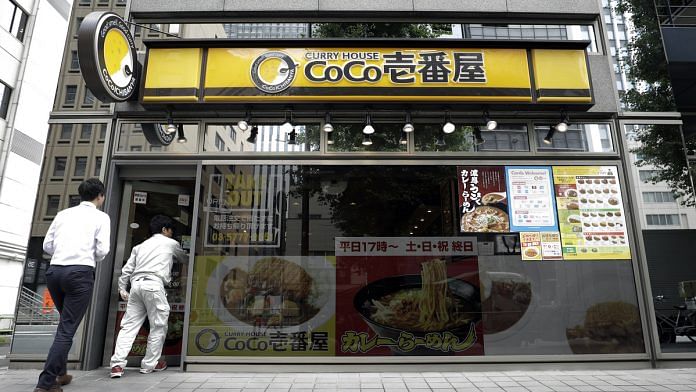 Customers enter a Curry House CoCo Ichibanya restaurant, operated by Ichibanya Co., in Tokyo| Photographer: Kiyoshi Ota | Bloomberg