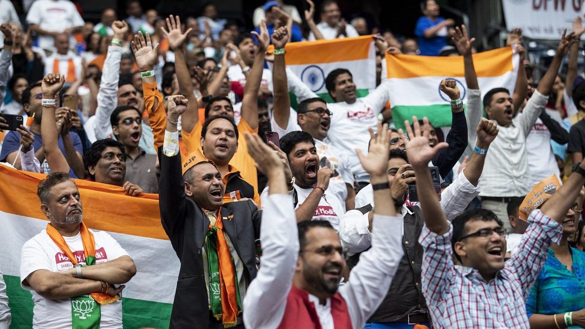 File photo | Attendees cheer as PM Narendra Modi (not pictured) speaks during the Howdy Modi Community Summit in Houston, Texas| Photo: Scott Dalton | Bloomberg