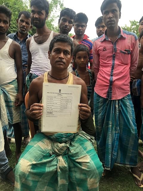 Abdul Karim of Shyampur village in Mangaldoi with his father’s legacy document from 1966. Karim’s name hasn’t figured in the list, even though that of his other family members - including sons - have.