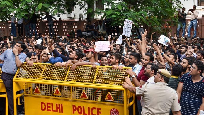Students of ICAI stage a protest outside its office in New Delhi