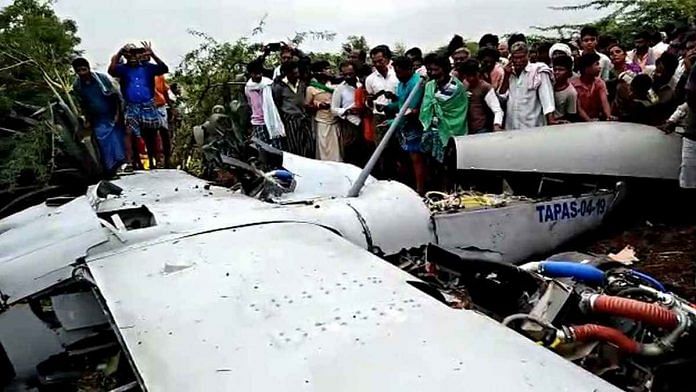 People gather after a UAV of the DRDO crashed near Chitradurga in Karnataka on 17 September | ANI
