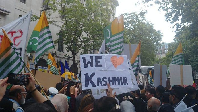 People protest against the communication shutdown in Kashmir, outside the Indian High Commission in London. | @PTIofficial | Twitter