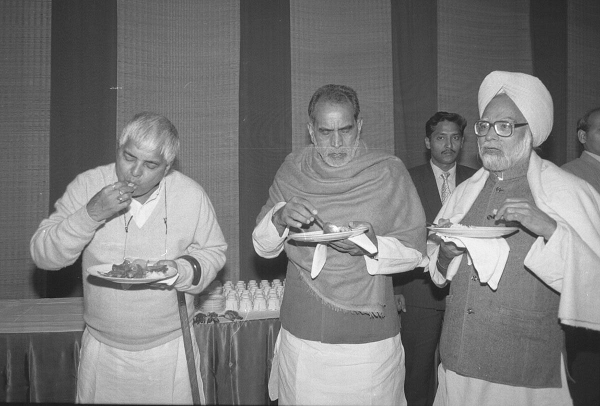 Manmohan Singh was the leader of the Opposition in Rajya Sabha from 1998 to 2004. He is seen here with Chandra Shekhar (centre) who was the PM during 1990-91, just before Narasimha Rao. The two are seen having lunch with Lalu Prasad Yadav in Bihar Bhavan.
