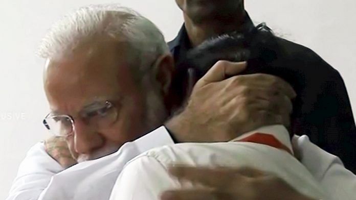 Prime Minister Narendra Modi consoles ISRO Chairman K. Sivan, Bengaluru, Saturday | PTI