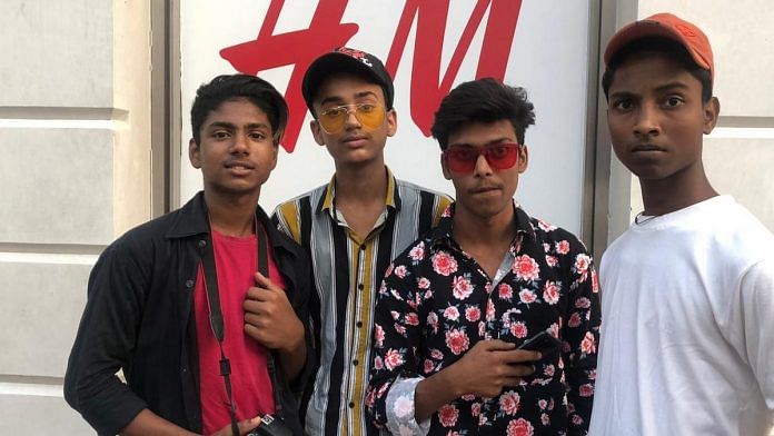 Boys congregate near the H&M showroom in Connaught Place to make TikTok videos | Jyoti Yadav | ThePrint