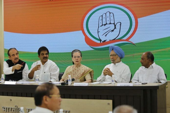 Congress interim president Sonia Gandhi, flanked by former PM Manmohan Singh and other senior leaders meeting to discuss plans for the 150th birth anniversary of Mahatma Gandhi | Photo: Suraj Singh Bisht | ThePrint