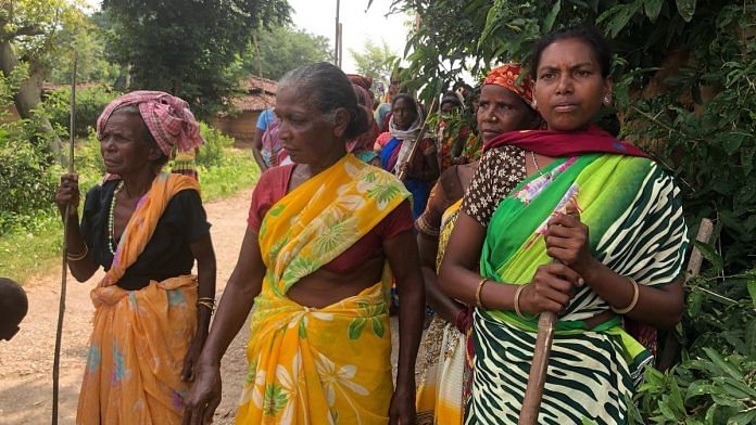 Women blocking the entry to Suari village in Jharkhand's Khunti district. Photo: Madhuparna Das/ThePrint