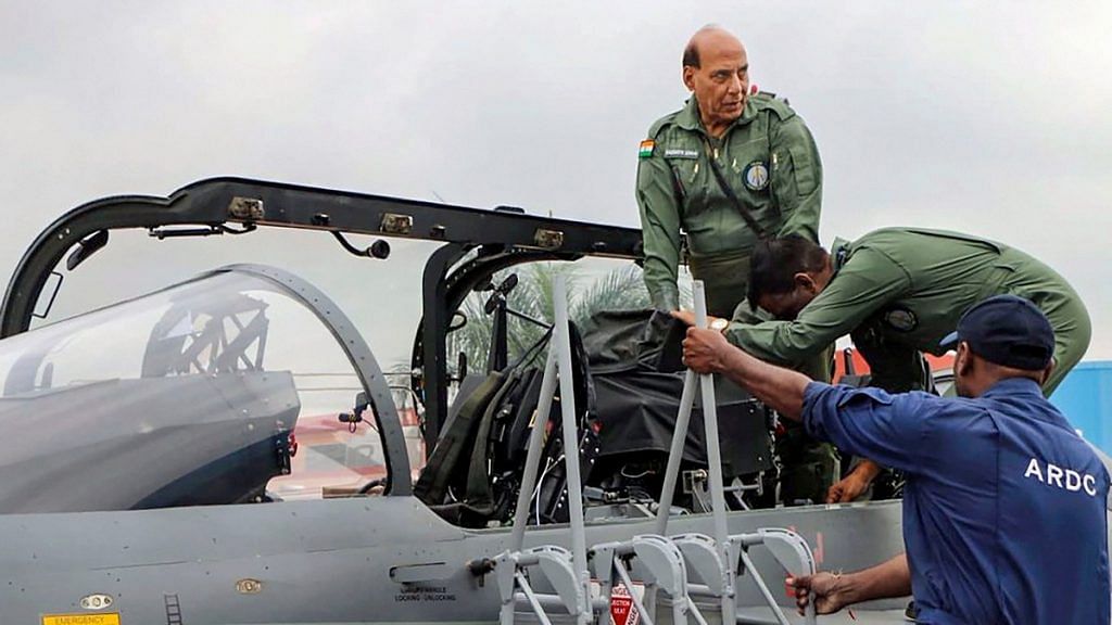 Defence Minister Rajnath Singh before he flew the Tejas fighter aircraft from the HAL airport in Bengaluru | PTI
