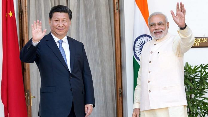 File photo of Prime Minister Narendra Modi and Chinese President Xi Jinping at Hyderabad House in New Delhi | Photo: Graham Crouch | Bloomberg