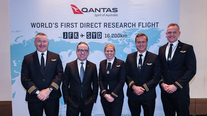 Alan Joyce, second left, with the flight crew in New York, Oct. 17. Photographer: James D. Morgan/Getty Images for Qantas