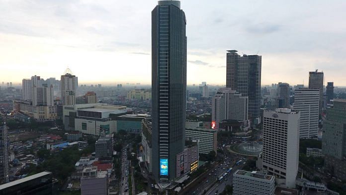 The Bank Central Asia (BCA) headquarters, center, stands in Jakarta, | Photographer: Dimas Ardian/Bloomberg