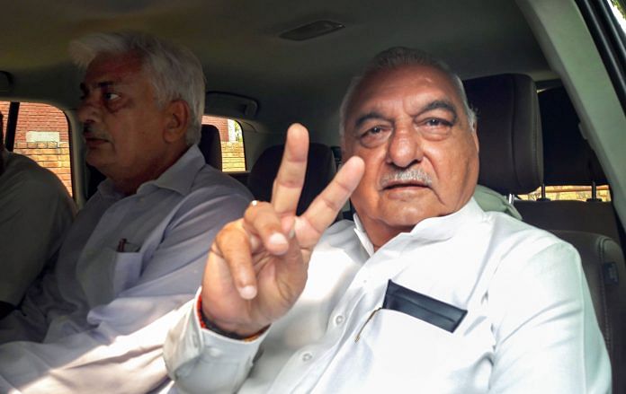 Bhupinder Singh Hooda outside a counting centre in Rohtak