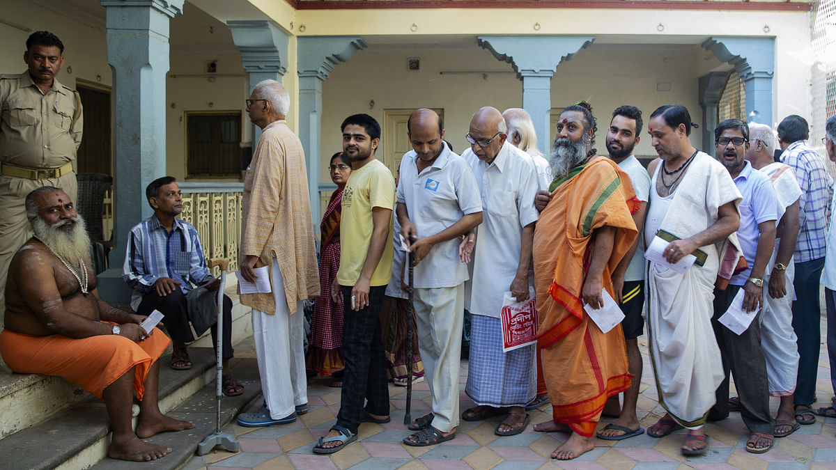 Voters stand in line at a polling station in Varanasi, Uttar Pradesh| Representational image | Kanishka Sonthalia/Bloomberg