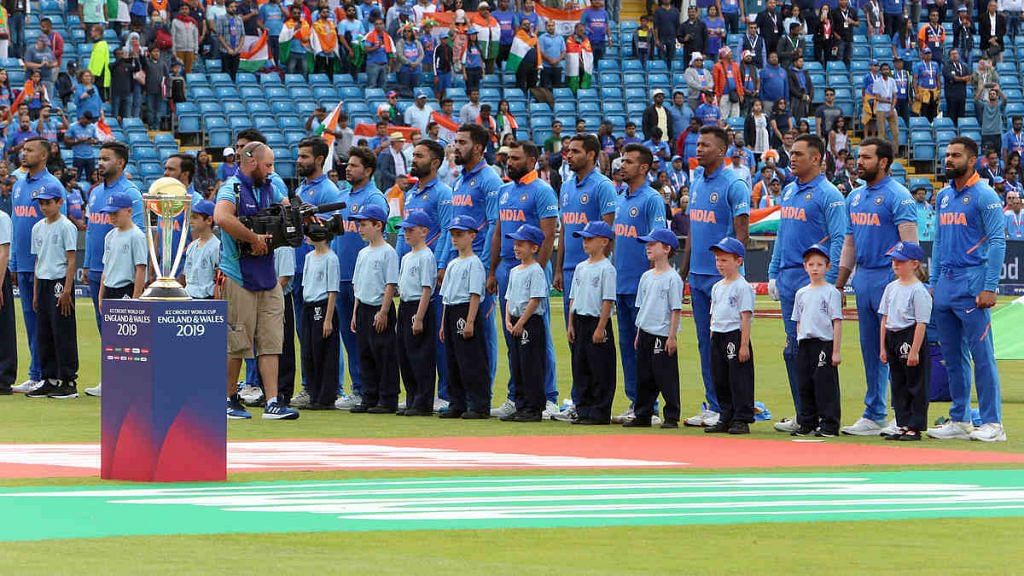 Indian cricket team standing for the national anthem during the World Cup