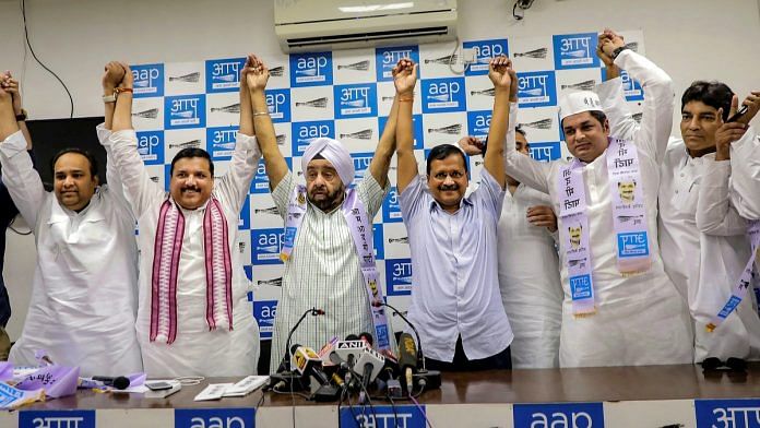 Four-time Congress MLA Parlad Singh Sawhney joins Aam Aadmi Party in the presence of party chief and Delhi Chief Minister Arvind Kejriwal at New Delhi. | PTI