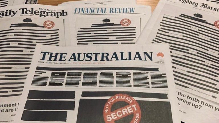 Australian newspapers black out front pages in united protest against media restrictions