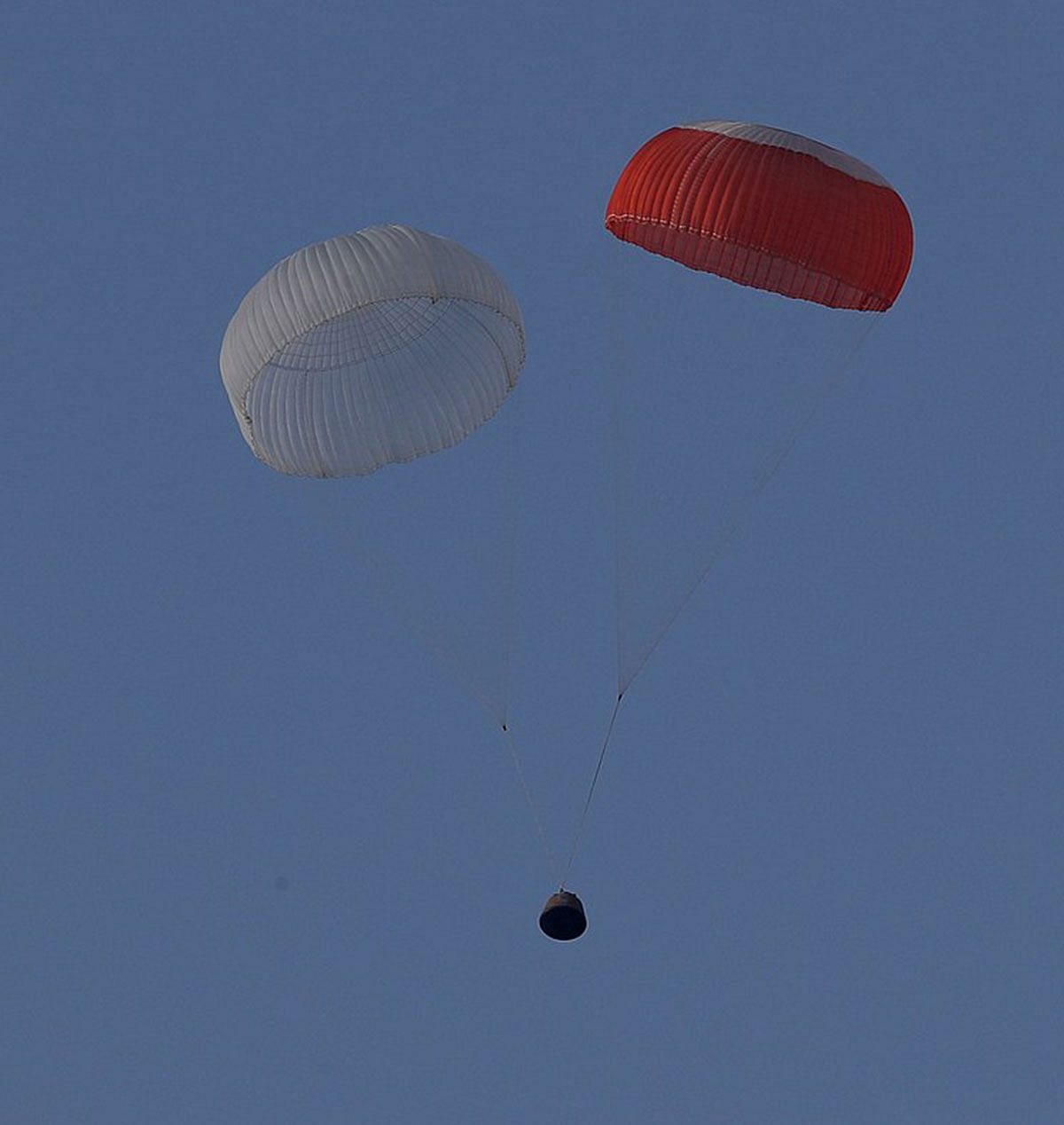 Dummy Gaganyaan crew module descends under parachutes, after Pad Abort Test conducted on 5 July 2018