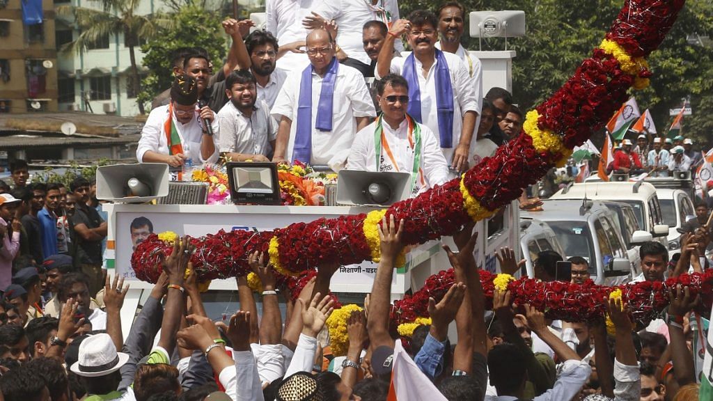 NCP chief Sharad Pawar during nomination filing procession of the party candidate from Mumbra Jintendra Awhad for the upcoming Maharashtra Assembly elections. | PTI