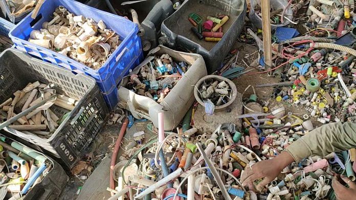Representational image | File photo of a waste picker segregating plastic waste at Tikri Kalan in New Delhi. | Simrin Sirur | ThePrint