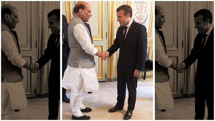 Defence Minister Rajnath Singh with French president Emmanuel Macron | PTI